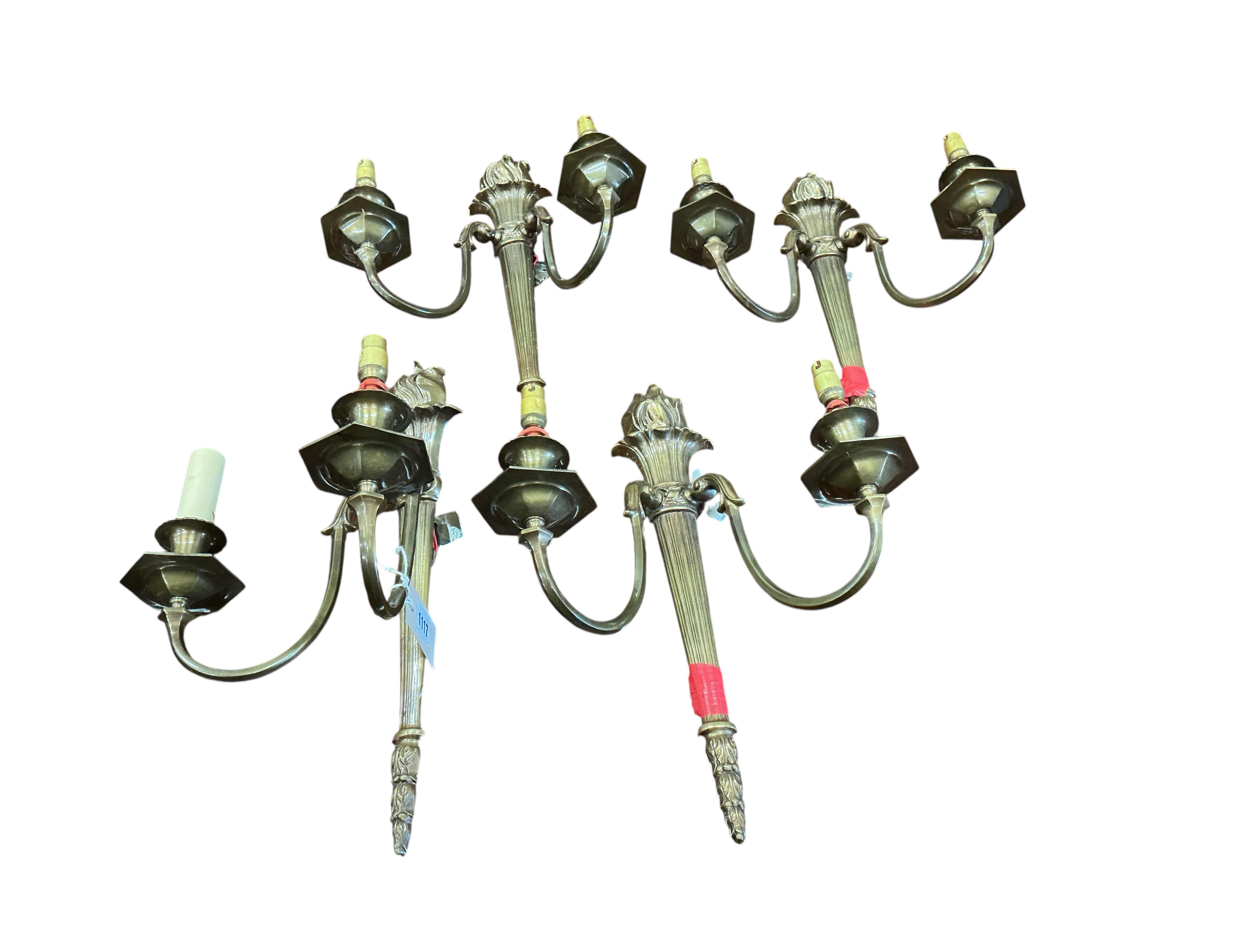 A set of four gilt metal twin branch wall lights with flambé finials and shades, height 41cm